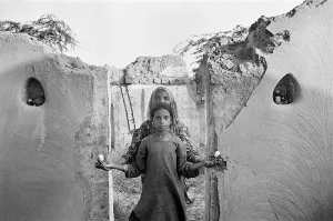 Karina and Nimli, in a home destroyed by flooding, Lunkaransar