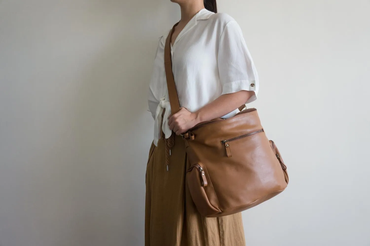 Noa Leather Bucket Backpack in Tan Brown