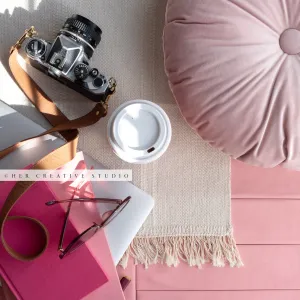 Pink Notebook, Camera on Pink Background. Stock Photo