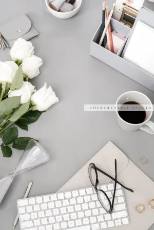 Roses, Hourglass & Keyboard on Grey Background. Stock Image
